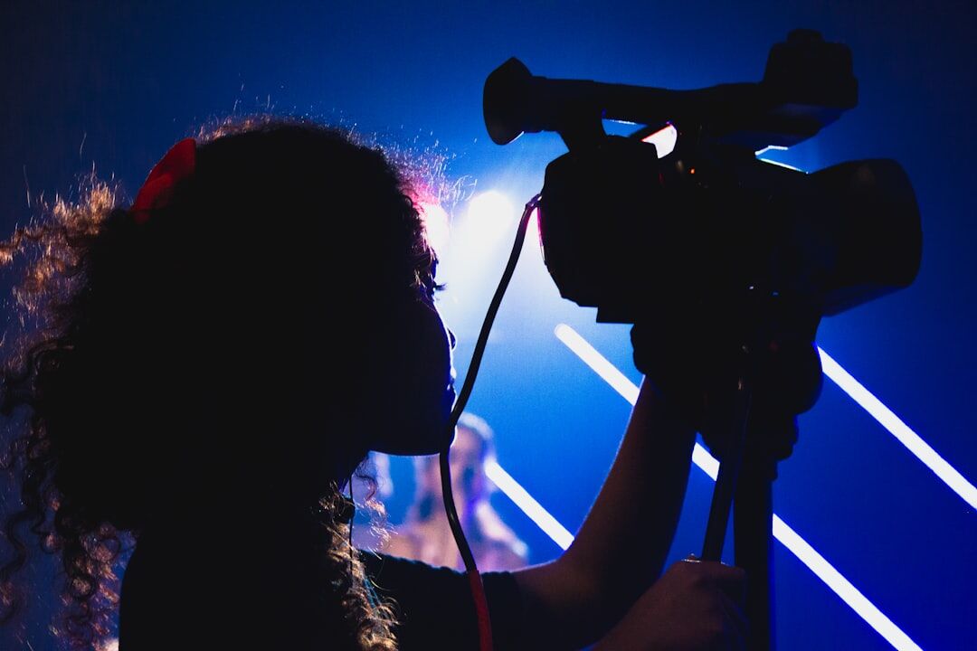 Turkish woman presenter rehearsing in front of a TV camera