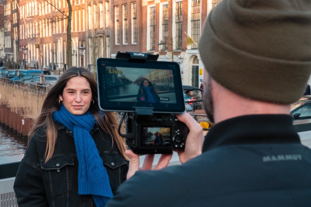 Reporter holding a microphone during an outdoor interview