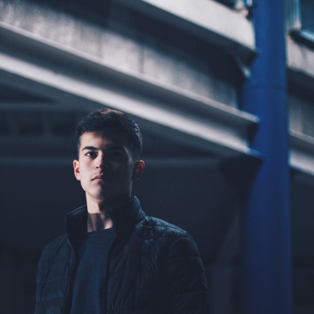 Portrait of a young Turkish male graduate working in television